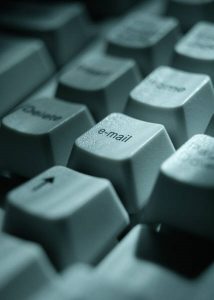Close up image of computer keyboard with an Email Key. Professional Email Writing 