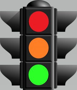 Traffic lights with Red, Orange and Green to help improve your emotional intelligence.