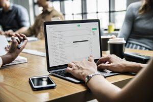 Person typing out an Email on Laptop