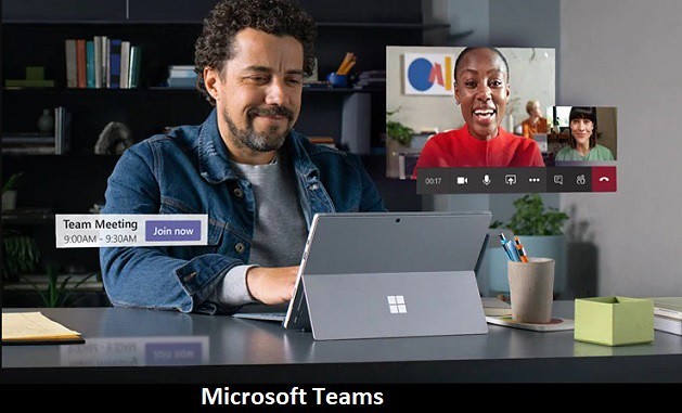 Man working on Surface Pro Laptop having a conversation Microsoft Teams