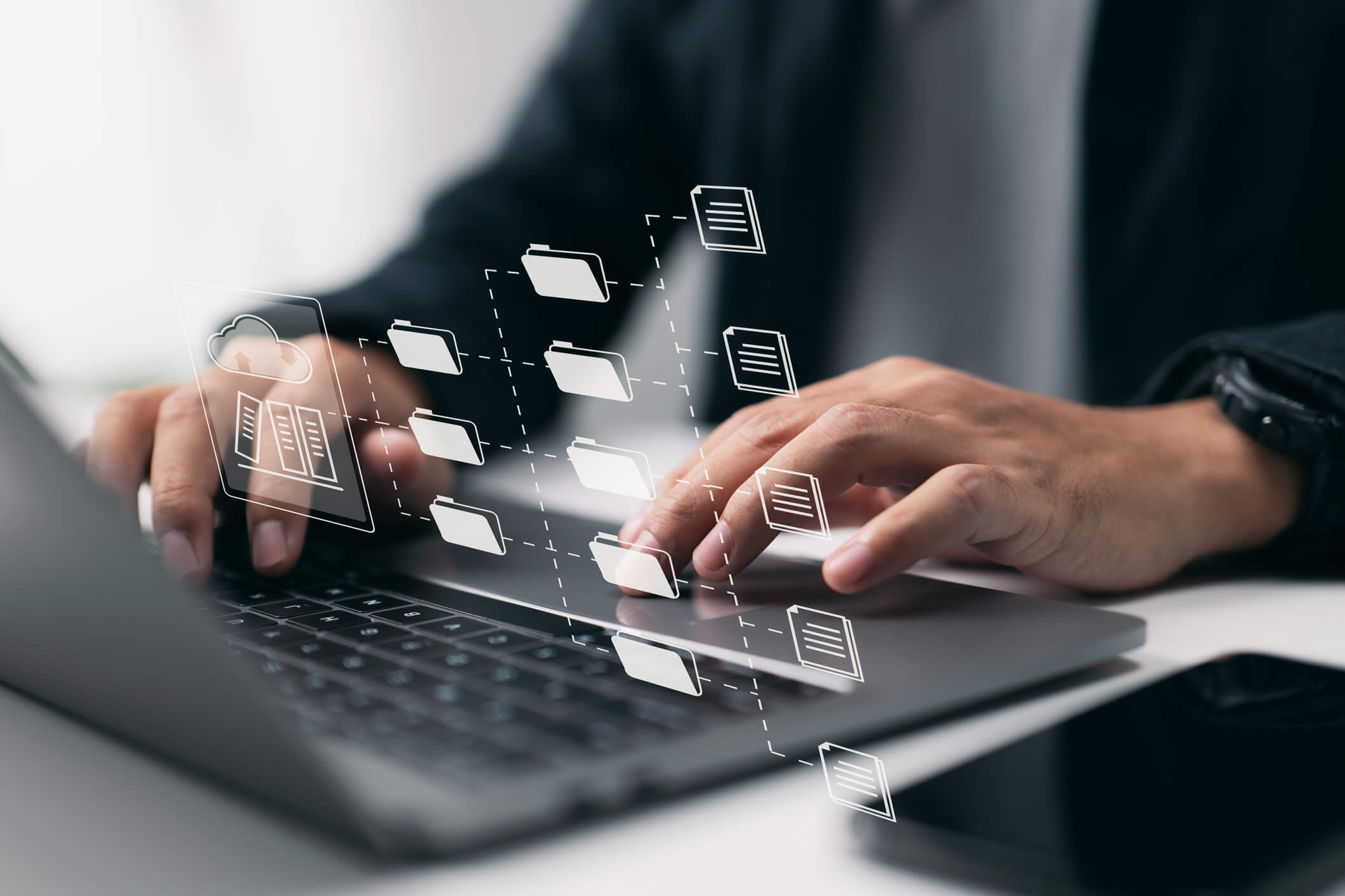 Man typing on Laptop with Email Folders superimposed.